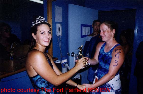 Miss Fort Fairfield, Melissa Butler passes out awards at the swim meet